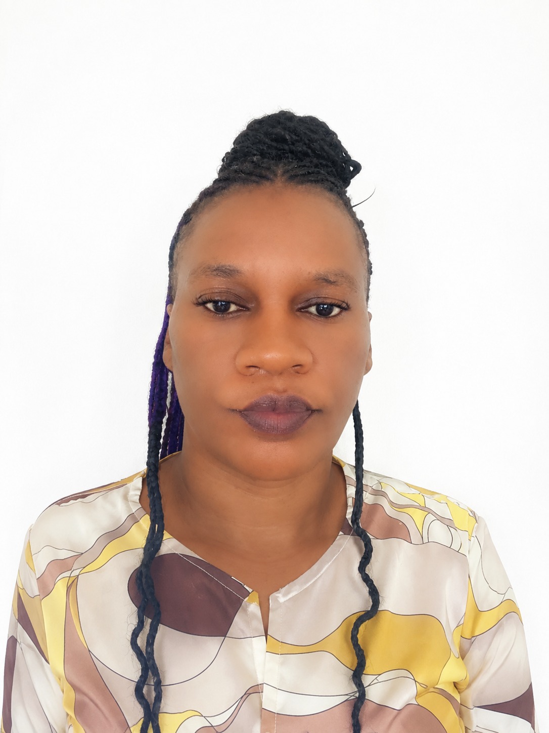 Ms. Mary Wanjiku — Executive Officer